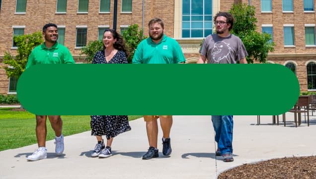 Students walking outside building