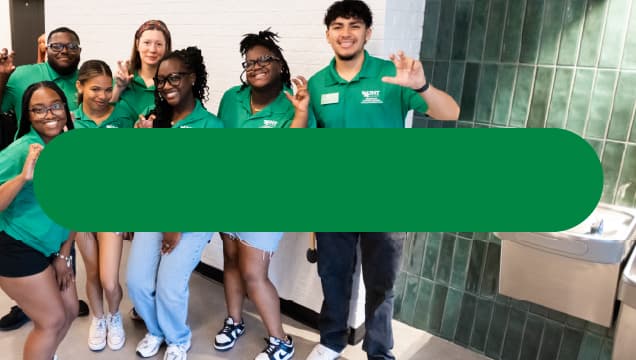 student in a building lobby